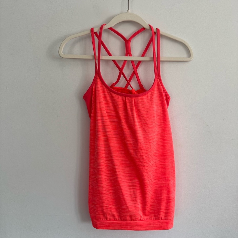 Athleta Shadow Stripe Energy Tank Neon Orange XS
with built in strappy bra